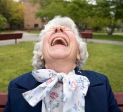 Senior Woman Laughing --- Image by © Steve Prezant/Corbis